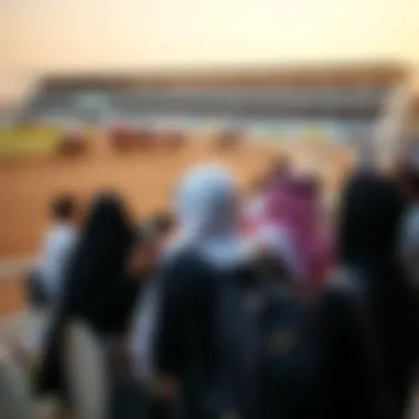 Spectators watching a thrilling camel race at the Dubai racetrack.