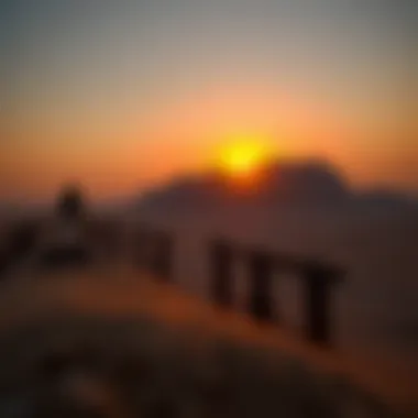 Sunset casting hues over the rugged terrain of Jebel Jais