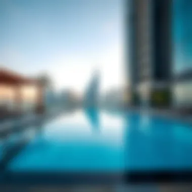 Swimming pool area at Orra Marina Tower with stunning skyline in the background