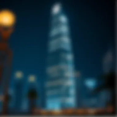 Night view of Adax Tower illuminated, capturing its prominence in Dubai's skyline